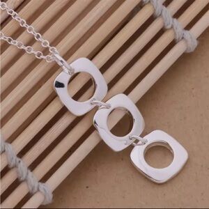 Elegant Silver Geometric Pendant Necklace